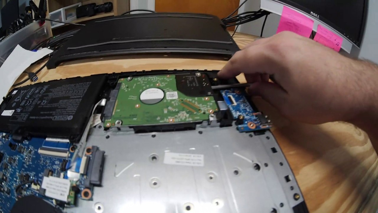 Some Jerk Used Double-Sided Tape to Replace a Hard Drive Caddy - Jody Bruchon