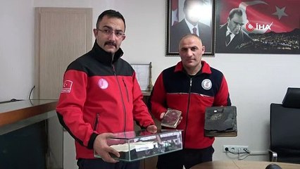 Yanmayan Kuran-ı Kerim'leri özenle saklıyorlar