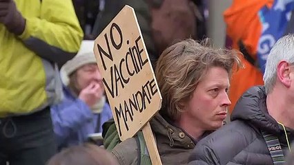Protestors march against NHS staff vaccine mandate