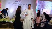 Sonam Kapoor flaunts blooming baby bump in off white ensemble