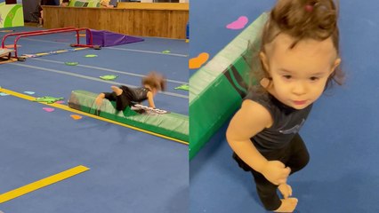 'Adorable toddler trips over walking beam while looking at ceiling fans '