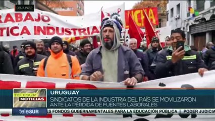 Скачать видео: Sindicatos de la industria en Uruguay realizan movilización y paro