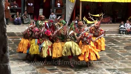 Rituals being performed in the form of Cham dance in Bhutan