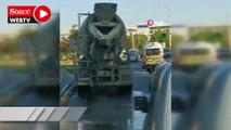 Beton mikseri asfalta beton dökerek ilerledi, o anlar kameraya yansıdı