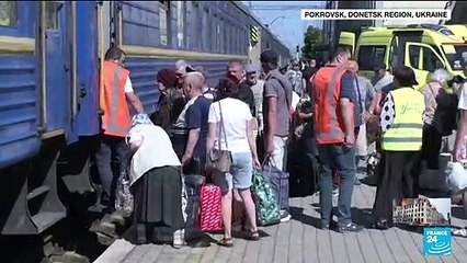 Civilians flee intense fighting in contested eastern Ukraine