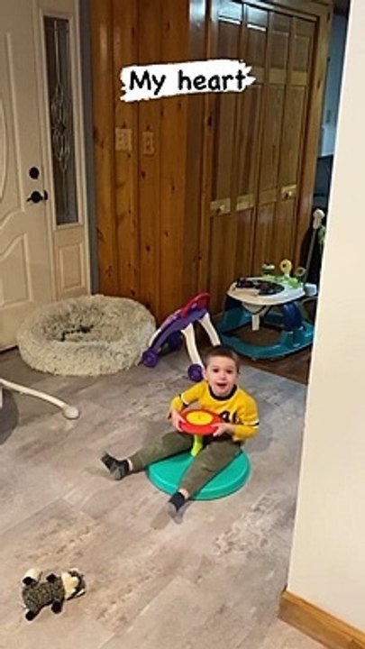 Playful kid enjoys endless hours on spinning toy