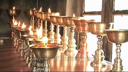Burning oil lamps in a gompa