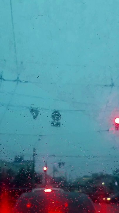 Cars are standing at a traffic light in our city in winter