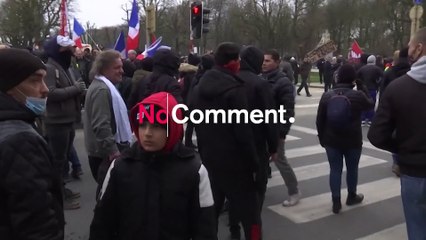 Protesters attack video team filming Belgian march against vaccinations and COVID-19 restrictions