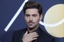 Zac Efron says a positive attitude has helped him to stay grounded