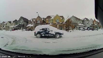 Driver Doesn't Bother to Wipe the Snow Off