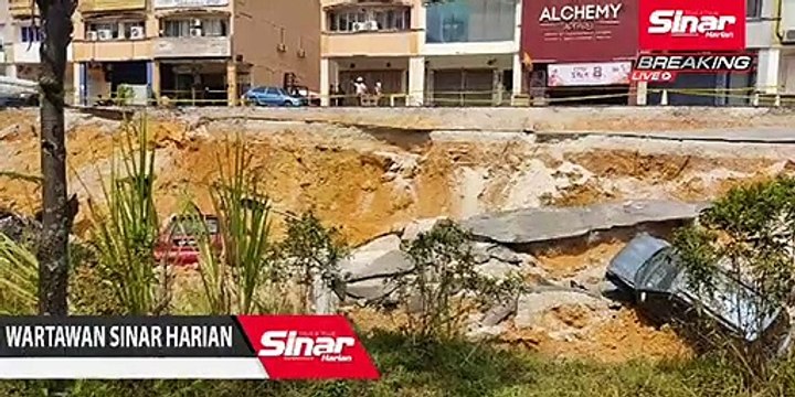 Tinjauan kesan runtuhan di Jalan LP1A2, Seri Kembangan, Selangor