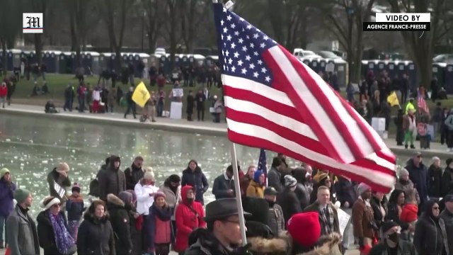 Anti-vaccine protesters march against Covid mandates in DC