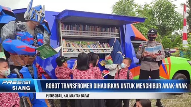 Polsek Putussibau utara lakukan Pengamanan Vaksin dan hibur anak-anak di Gerai Vaksin di SDN 04 Putussibau