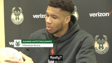 Giannis enjoys post-game chicken during press conference