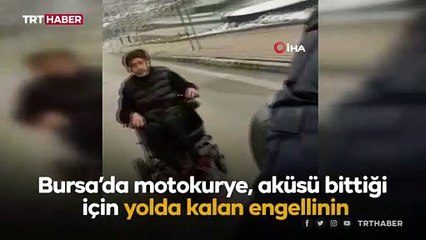 Aküsü biten engelli aracını motosikletiyle çekti