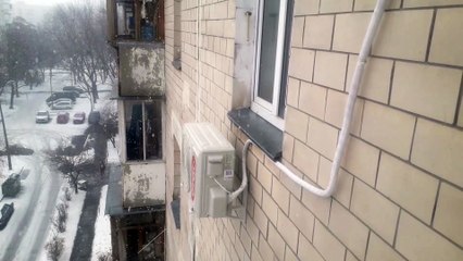 Installed an external inverter air conditioner unit on the facade of the house