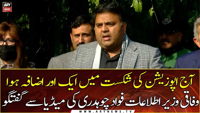 Federal Minister for Information Fawad Chaudhry talks to media
