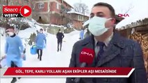 Göl, tepe, karlı yolları aşan ekipler aşı mesaisinde