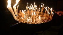 Burning Candles at Church of The Holy Sepulchre in Jerusalem, Israel