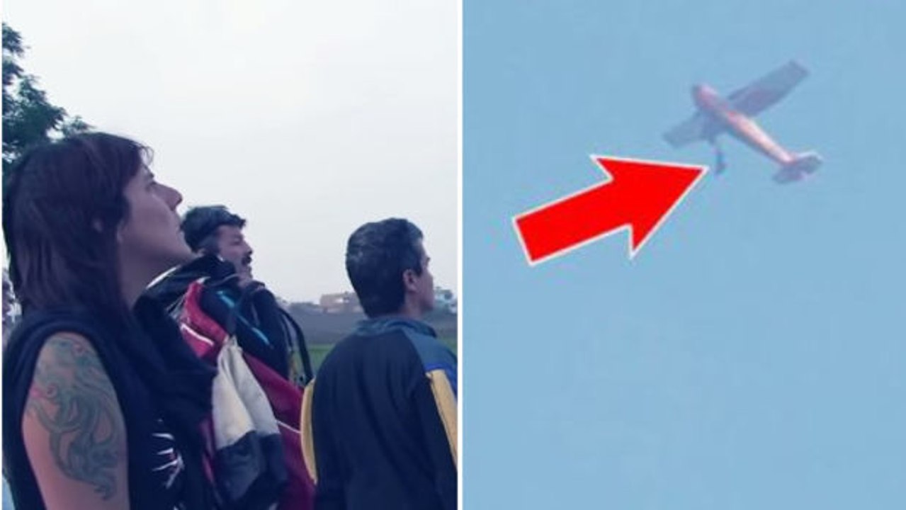 Er will mit dem fallschirm abspringen ... bleibt aber am flugzeug hängen