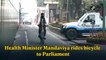 Health Minister Mandaviya rides bicycle to Parliament