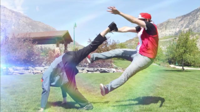 Deux dresseurs Pokémon se livrent un combat épique, mais quelle en est la raison ?