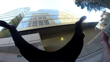 'Parkour enthusiast slammed back-first onto the ground while descending a wall '