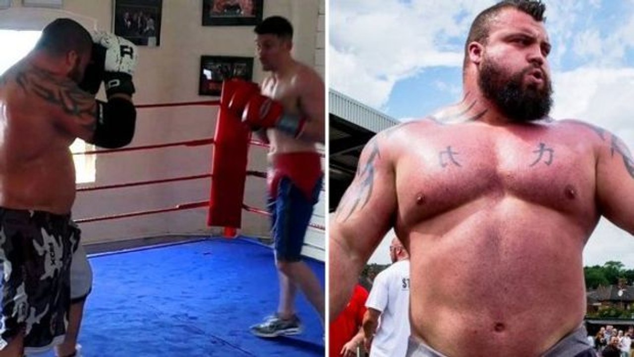 Der strongman eddie hall tritt im ring gegen einen profiboxer an