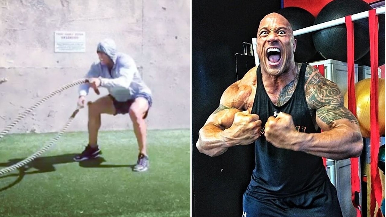 The Rock zeigt seine Kampfmaschinen-Routine an der 'Battle Rope'