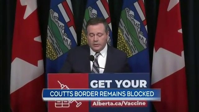 The Royal Canadian Mounted Police begins removing protesters and vehicles at the Coats Border Crossing | erecting secondary barriers