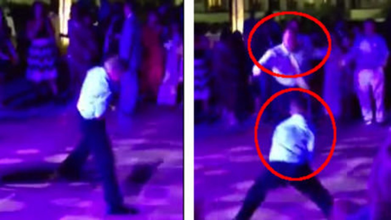 Ce père et son fils improvisent une danse originale lors d'une fête. Et le résultat est incroyable !
