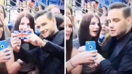 Ce membre des One Direction n'a pas l'air d'aimer prendre des photos avec ses fans...