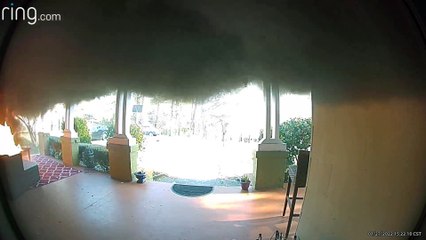 Husband Hurries to Put Out House Fire