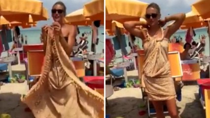 Elle transforme son paréo en une magnifique robe en quelques secondes