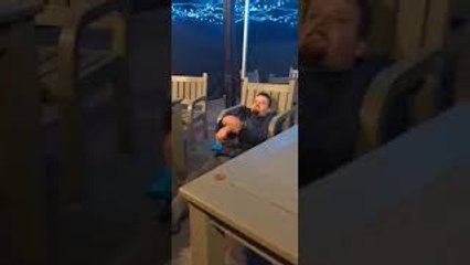 Man Falls Through Broken Chair