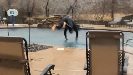Tennessee man takes advantage of icy weather to try out a new wetsuit