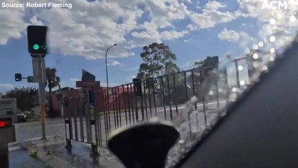 Driving through flood waters in Warilla | January 17, 2022 | ACM