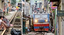 Hanoï (Vietnam) : le train qui passe en pleine rue et frôle les habitations