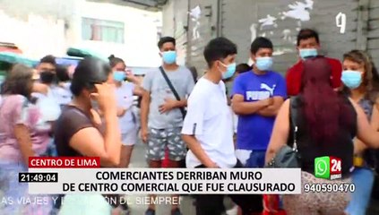 Centro de Lima: comerciantes derriban muro de centro comercial que fue clausurado