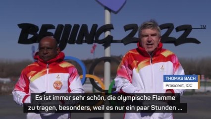 Bach: “Olympische Fackel ein Symbol des Friedens”