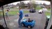 Child Sneaks Up on Dad with Toy Car