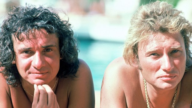 Johnny Hallyday : les raisons de son conflit avec Michel Sardou dévoilées