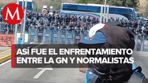 Enfrentamiento entre normalistas y Guardia Nacional deja 14 elementos heridos