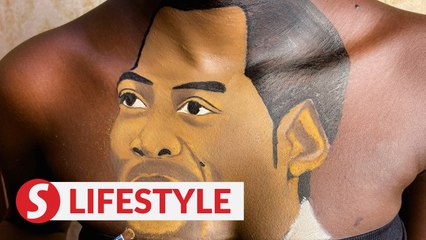 Nigerian artist paints portraits on her body