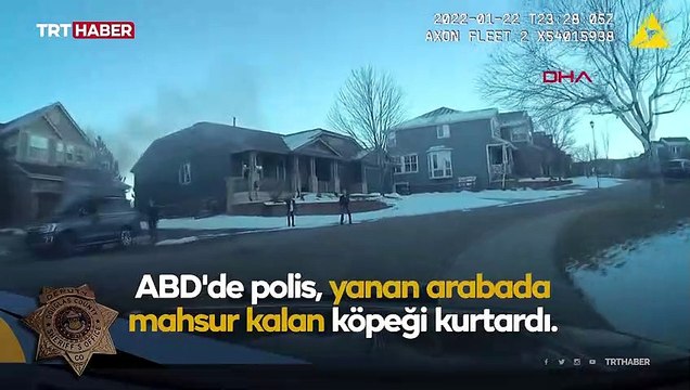 ABD'de polis yanan arabanın içinde mahsur kalan köpeği kurtardı