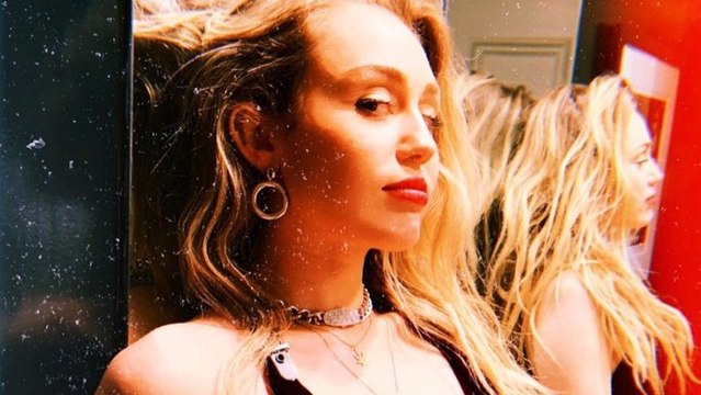 Miley Cyrus’ Plunging Neckline Reveals A Lot On Instagram