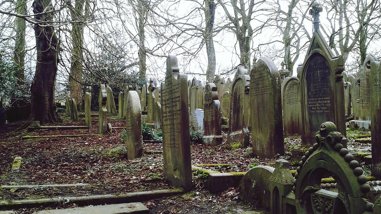 Police caught a man who was pretending to be a ghost in a local cemetery