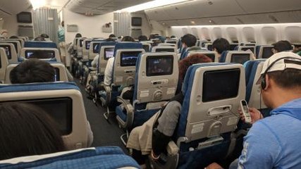 They Got On The Plane To Find Mysterious Bags On Each Of Their Seats - And Couldn't Believe What Was Inside