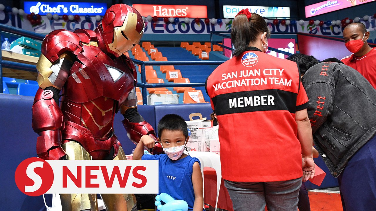 Manila’s Covid-19 vaccination centre turned into circus fanfare